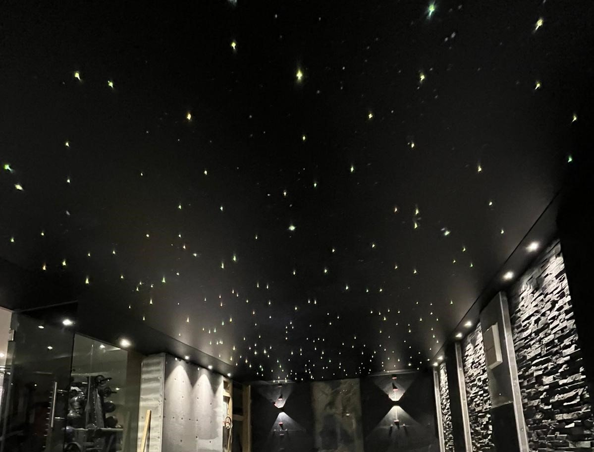 Dark room with star ceiling
